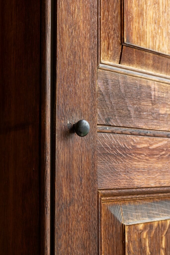 A Vibrant Oak Wood Wardrobe With Visible Grain Patterns